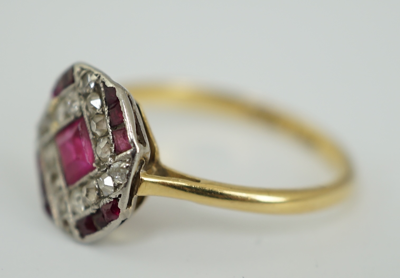 An 18ct, plat. and solitaire diamond set ring, size O, gross weight 1.7 grams. Fair condition.
